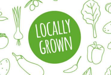 "Locally Grown" in a green circle surrounded by drawings of vegetables