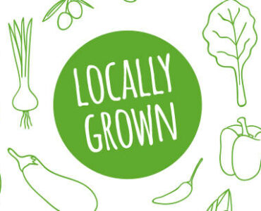 "Locally Grown" in a green circle surrounded by drawings of vegetables